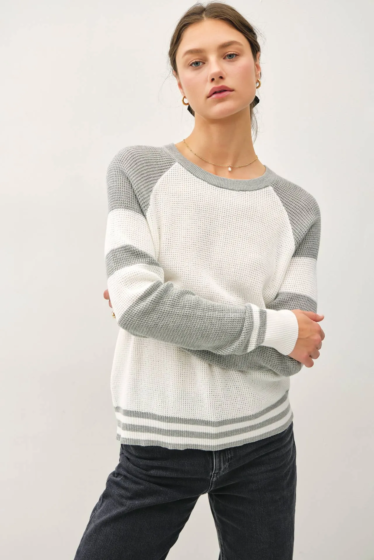 BASEBALL STYLE SWEATER WITH STRIPED ACCENTS